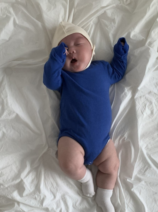Second image of Blue | Front view of the patch onesie in Blue