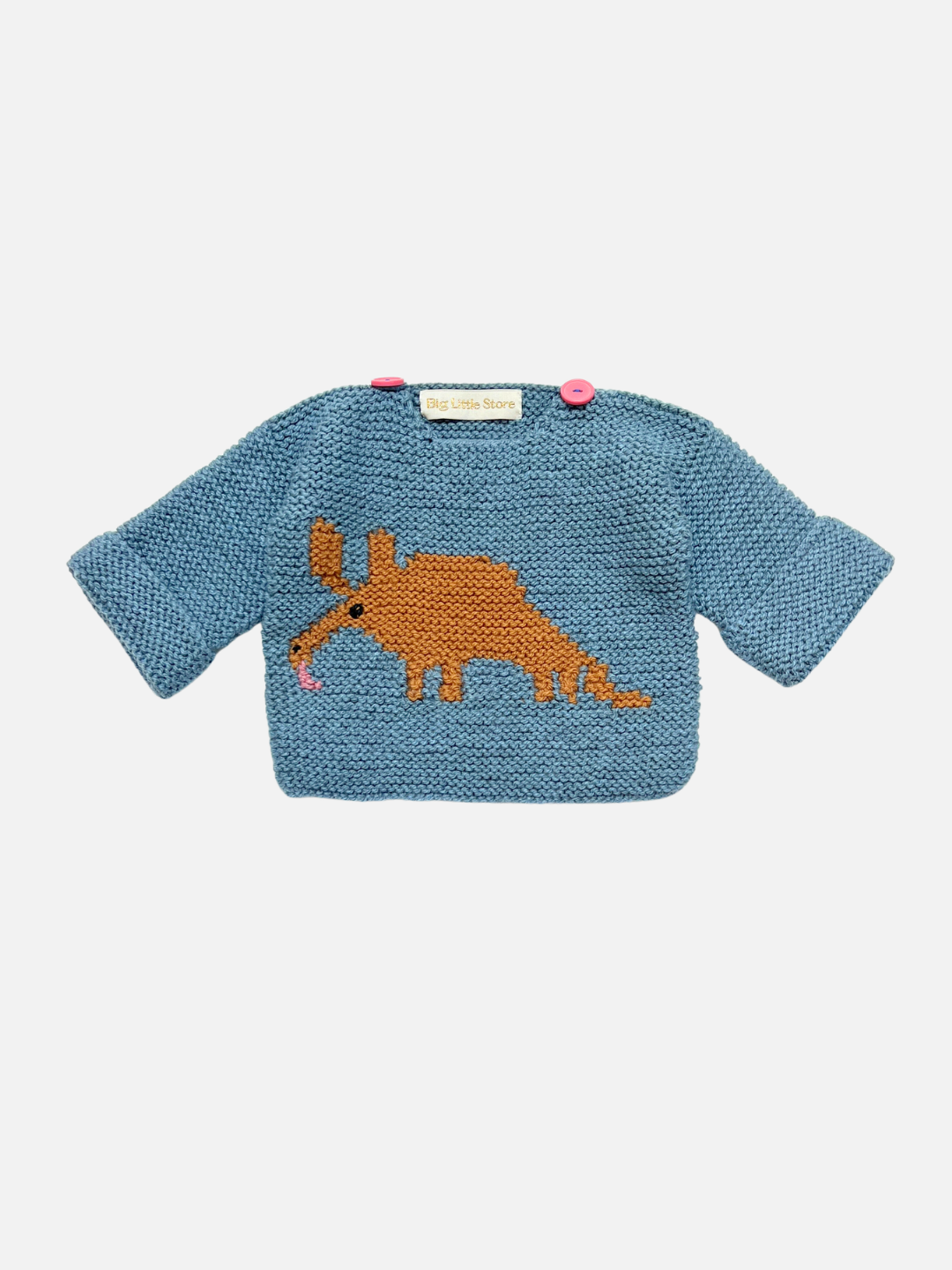 A blue knit baby sweater featuring a crocheted brown anteater on the front, with two pink buttons at the collar, shown against a light gray background.