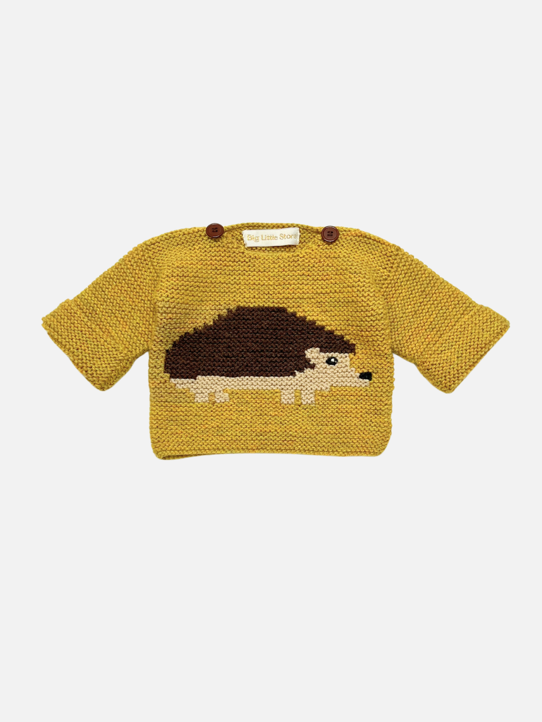 F (yellow hedgehog) | Knitted baby sweater in ochre yellow featuring a hedgehog motif laid on a white background.