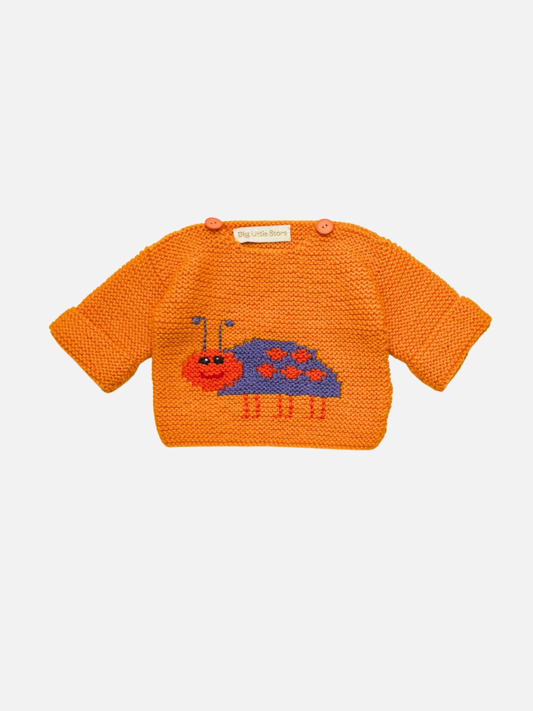 L (orange bug) | Knitted baby sweater in orange featuring a purple ladybug, laid on a white background.