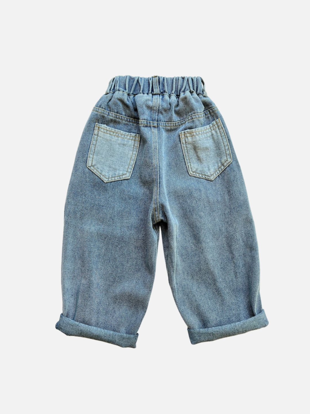 A pair of kids' jeans in mid blue denim with two lighter blue pockets, back view