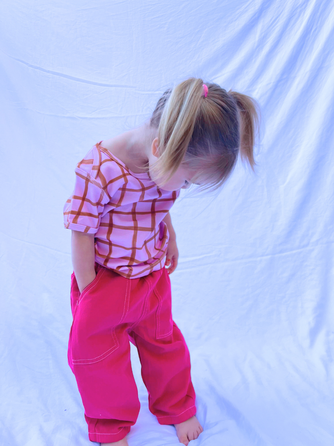 Magenta | Magenta children's TOPSTITCH TWILL PANTS made from soft cotton twill, featuring two front pockets and an elasticated waist.