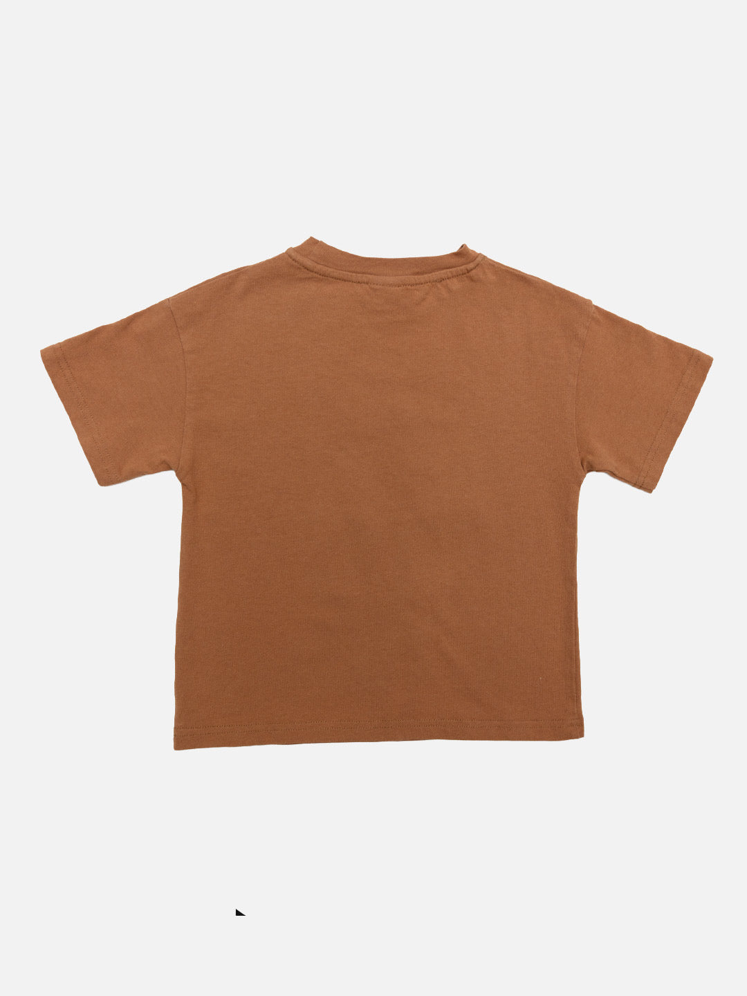 Child wearing a brown t-shirt with colorful cat designs, gray cap, gray pants, and orange Crocs standing against a white wall.