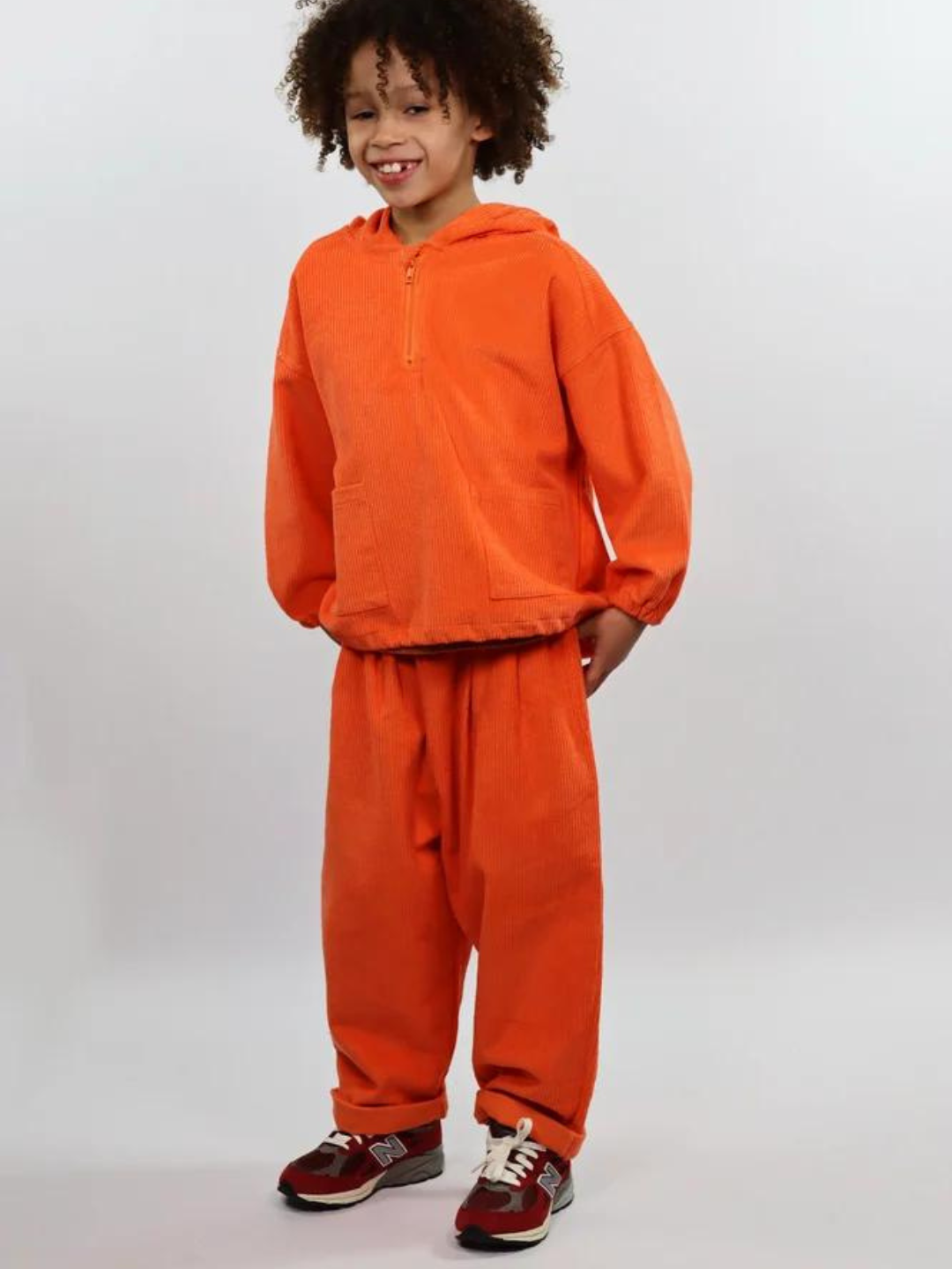Orange | Child wearing orange kids' hooded smock and pants