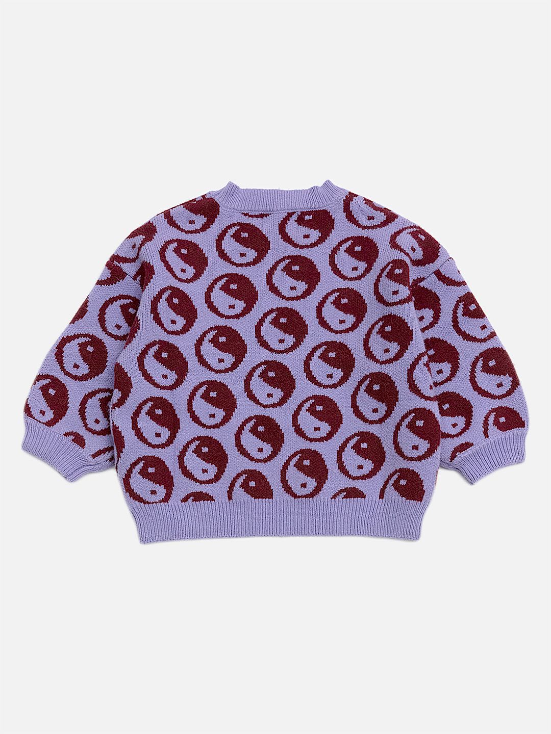 A kids' sweater with dark red yin and yang circles on a violet background, rear view