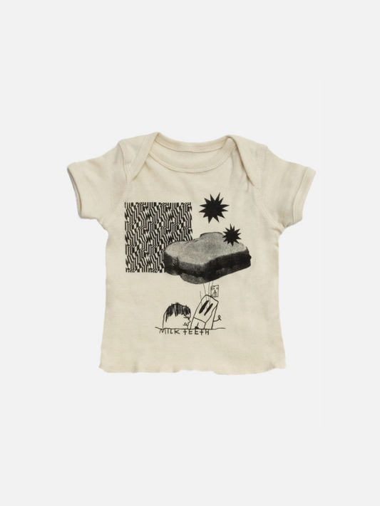 Image of A baby tee shirt with lap shoulders, printed with a PBJ sandwich, star and zigzag patterns, a toaster and the words Milk Teeth