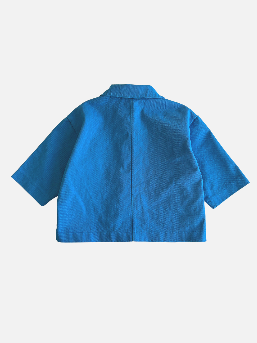 A kids' jacket in sky blue, back view