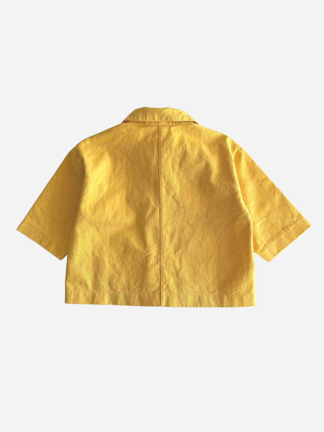 A kids' jacket in yellow, back view