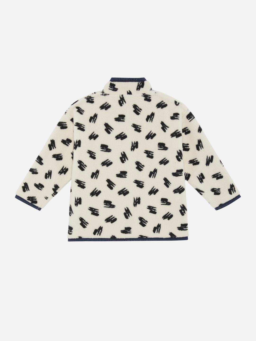 A kids' jacket in a pattern of black scribbles on a cream background, back view