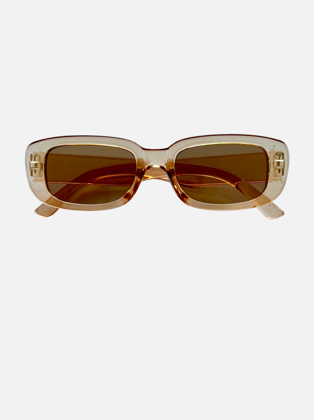 A pair of kids' sunglasses with translucent frames and brown lenese