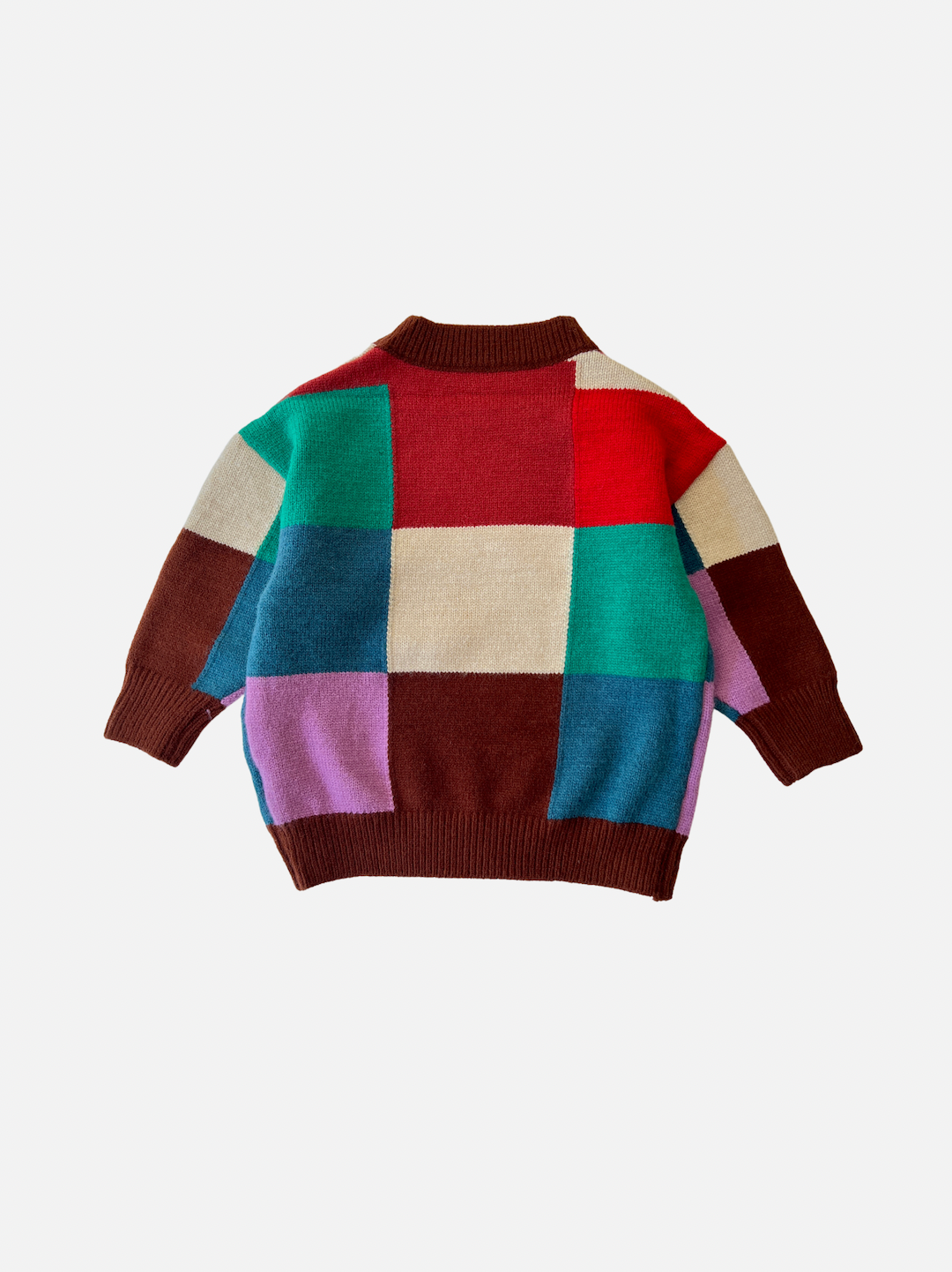 A kids' colorblock sweater in shades of red, pink, blue, green, cream and brown, back view