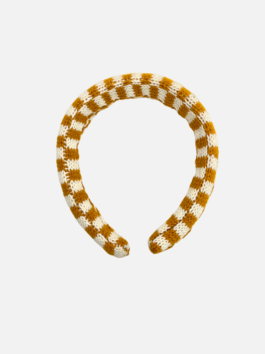 A kids' knitted headband in an ochre and cream check