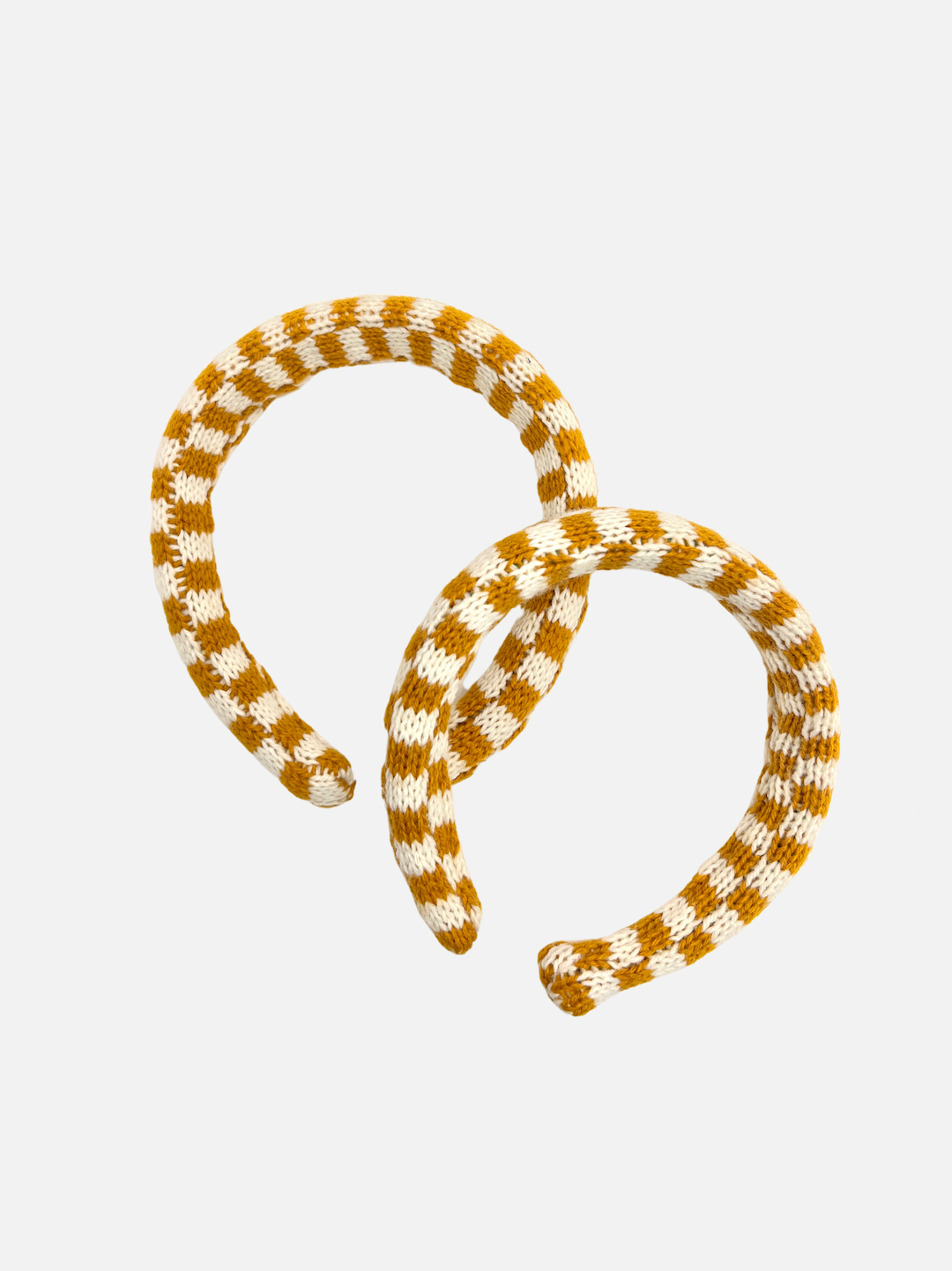 Ochre Checks | Two sizes of kids' knitted headband in an ochre and cream check