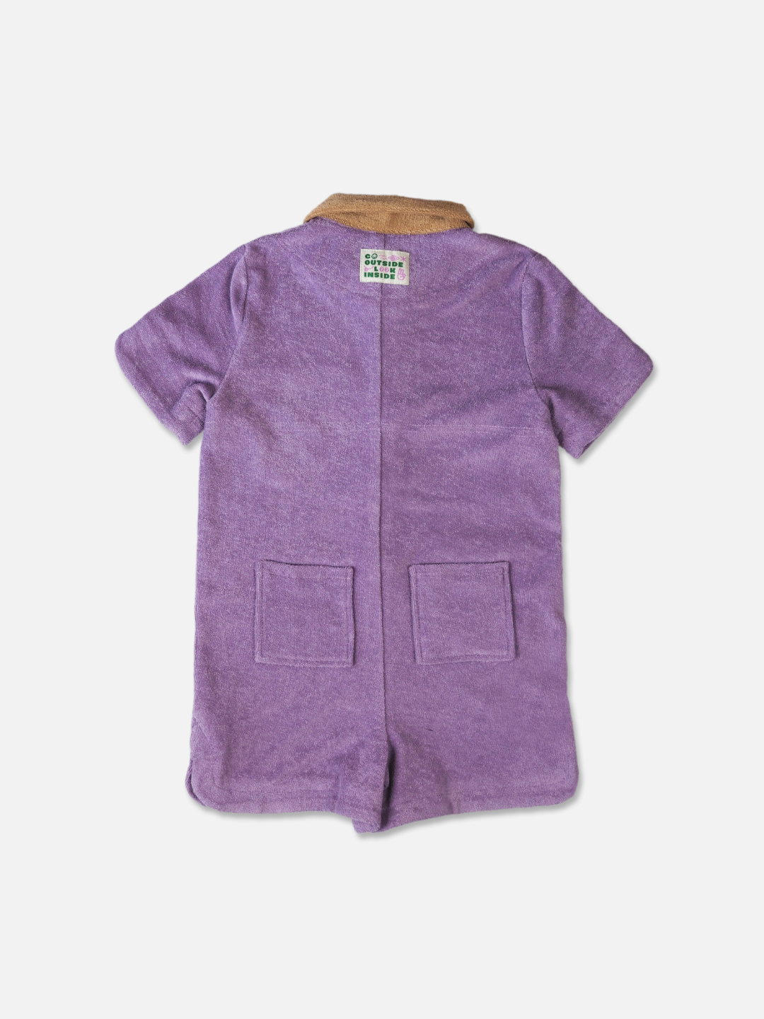 Plum | Rear view of a kids' jumpsuit in pale plum with sand collar, and two back pockets
